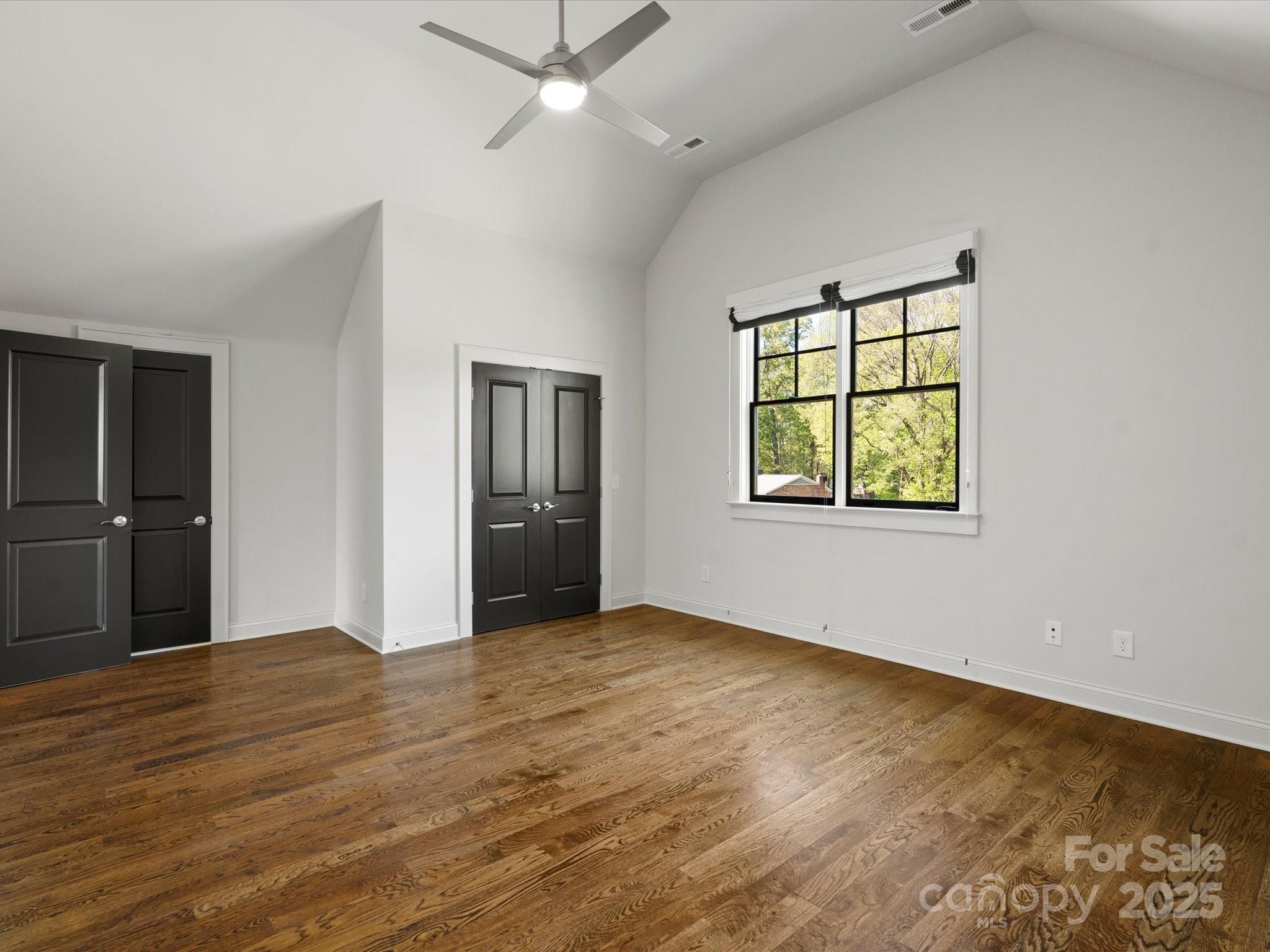 6700 Folger Drive Charlotte, NC 28270 - Photo 34 of 48 wooden floor in an empty room with a window