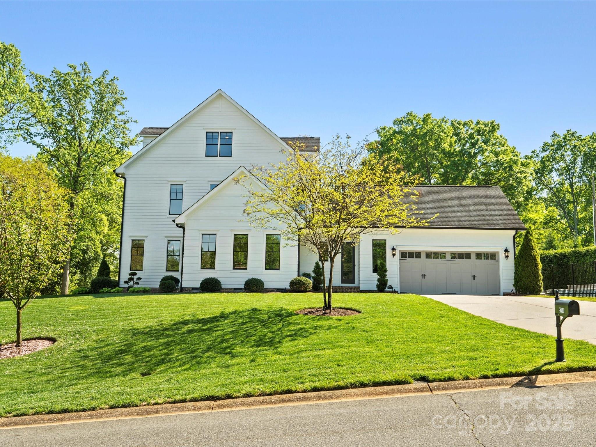 6700 Folger Drive Charlotte, NC 28270 - Photo 38 of 48 a front view of a house with a yard