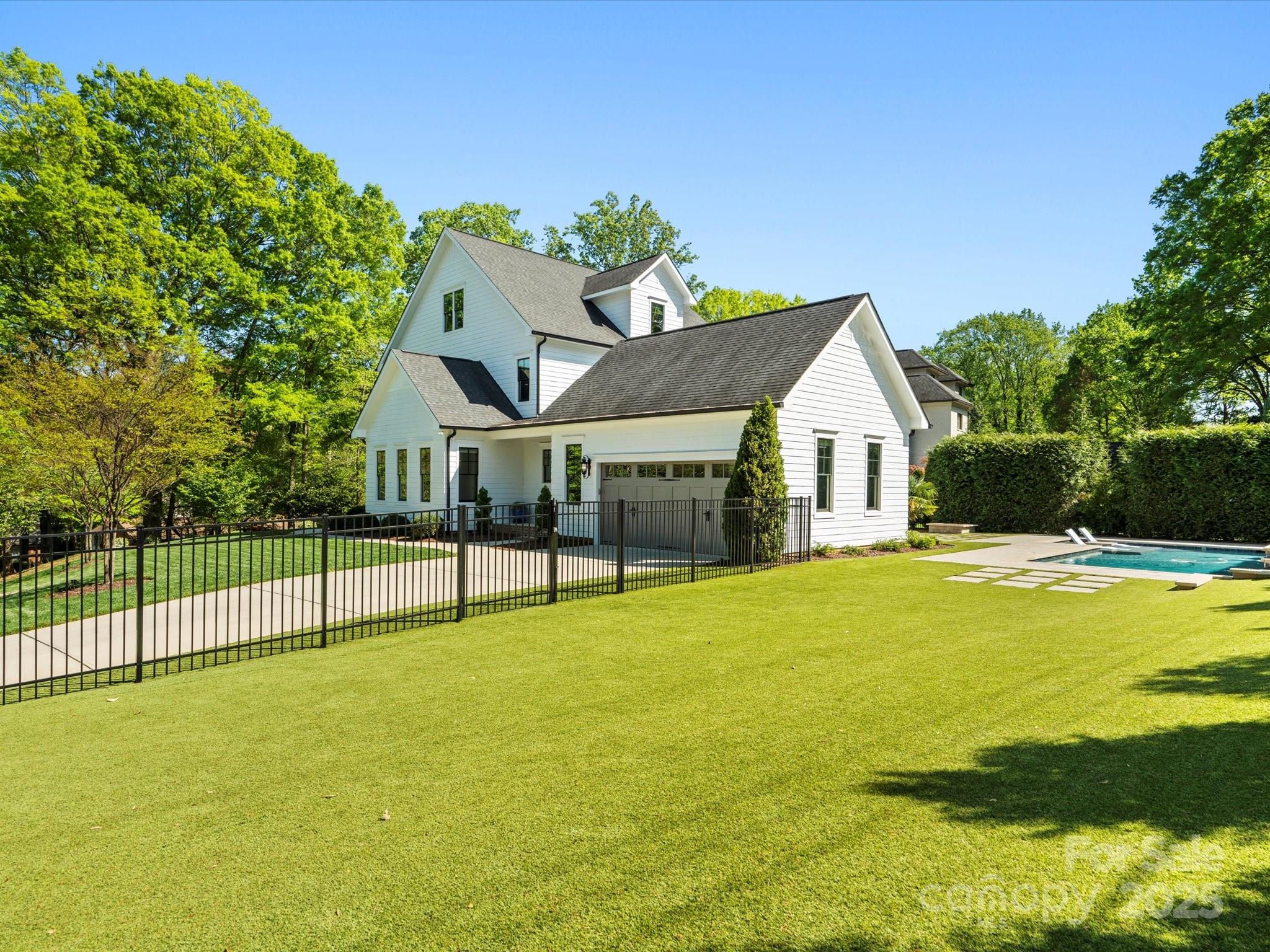 6700 Folger Drive Charlotte, NC 28270 - Photo 39 of 48 a view of house with swimming pool and yard