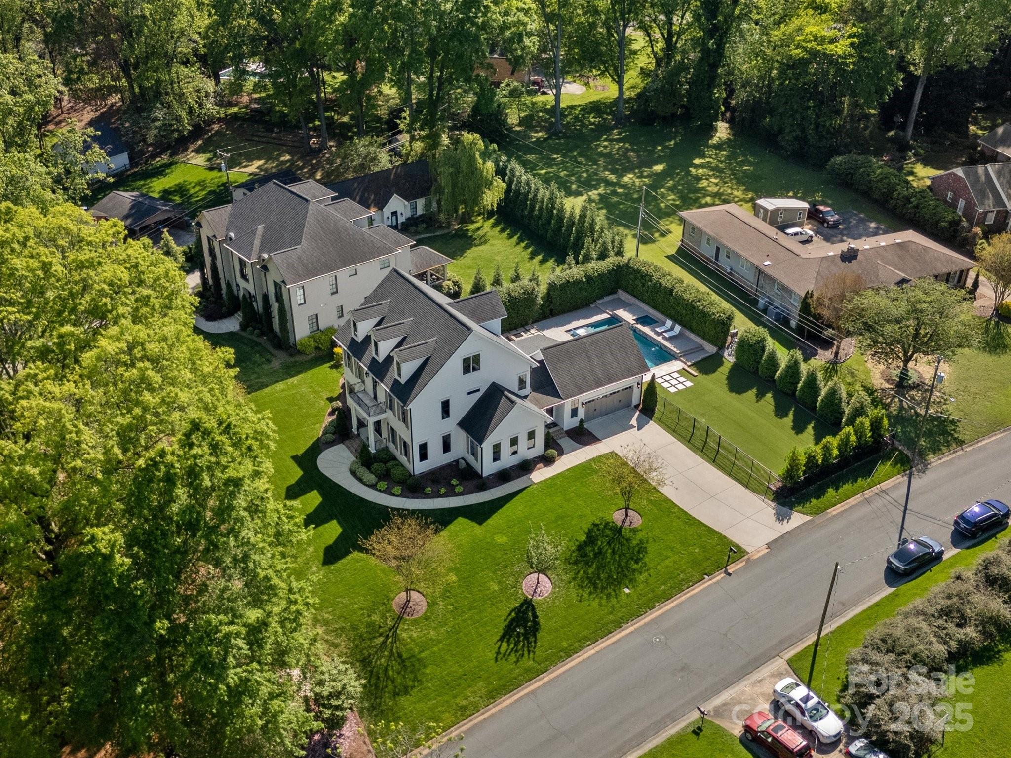 6700 Folger Drive Charlotte, NC 28270 - Photo 46 of 48 an aerial view of a house with a garden