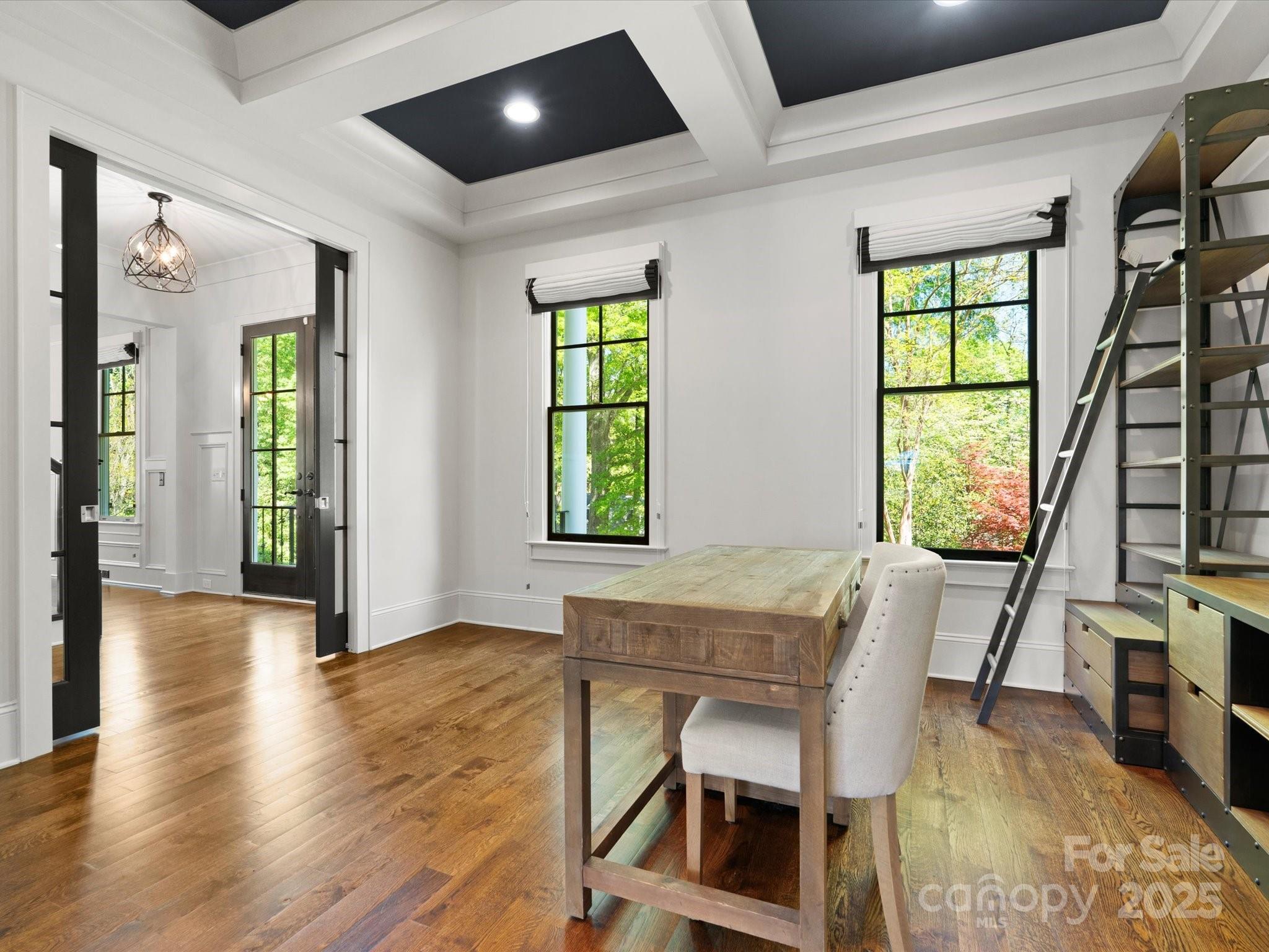 6700 Folger Drive Charlotte, NC 28270 - Photo 8 of 48 a view of a dining room with furniture window and wooden floor