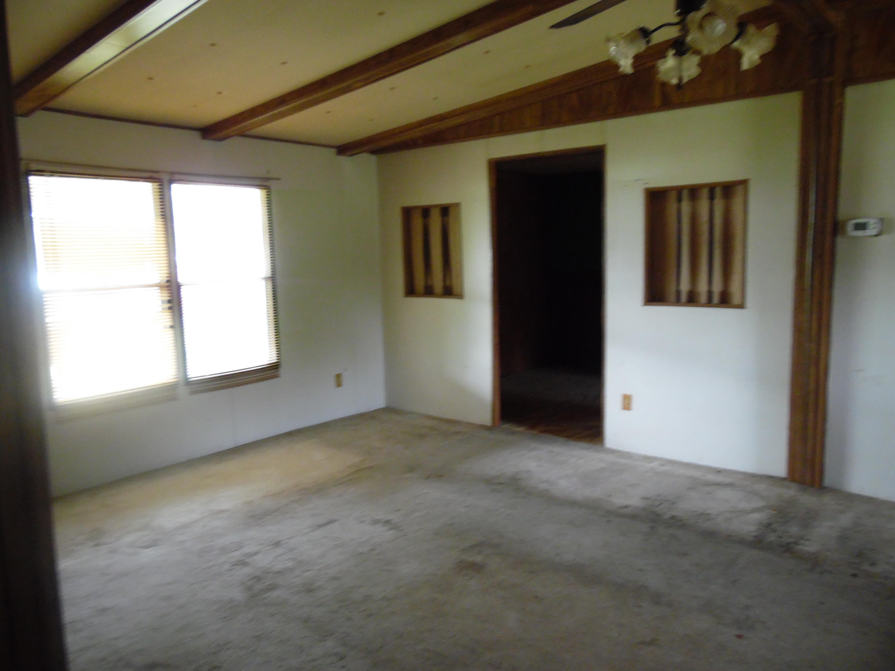 365 Vanderheide Road DeFuniak Springs, FL 32433 - Photo 15 of 34 Greatroom with doorway to dining room