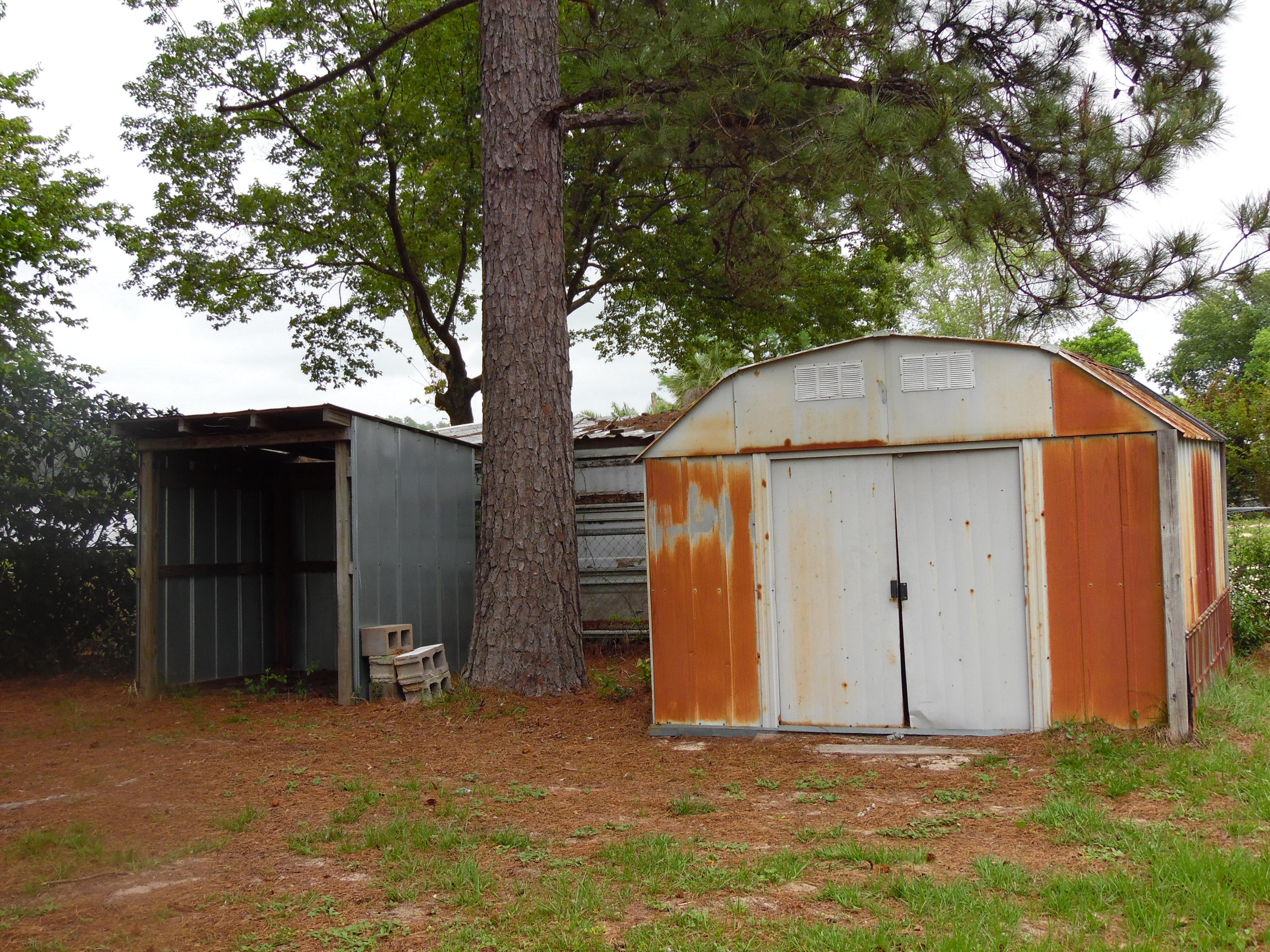 365 Vanderheide Road DeFuniak Springs, FL 32433 - Photo 32 of 34 Storage sheds in backyard