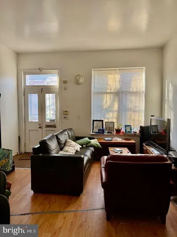 a table with chairs and window