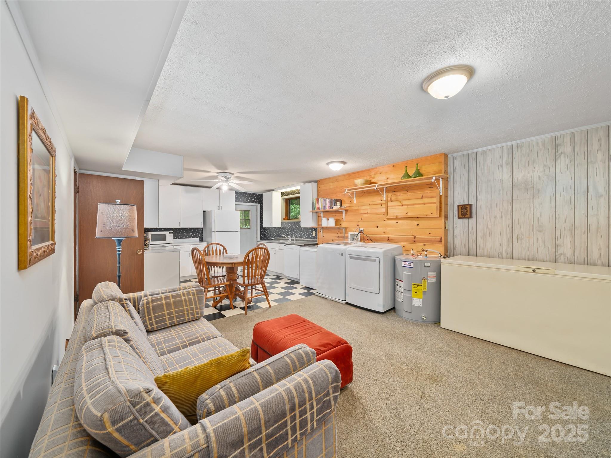 59 Deer Place Road Spruce Pine, NC 28777 - Photo 18 of 40 a living room with furniture and a table