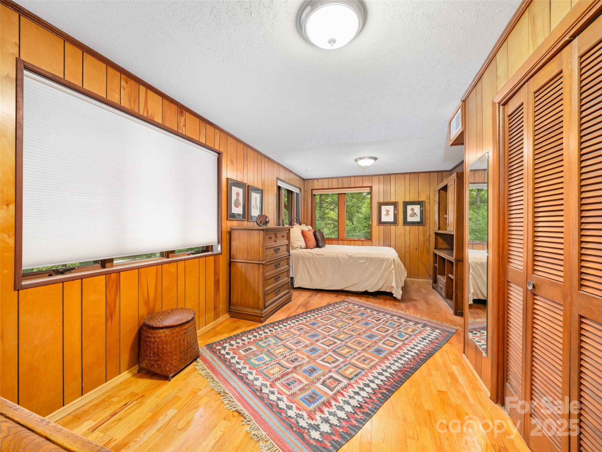 59 Deer Place Road Spruce Pine, NC 28777 - Photo 22 of 40 a bedroom with window
