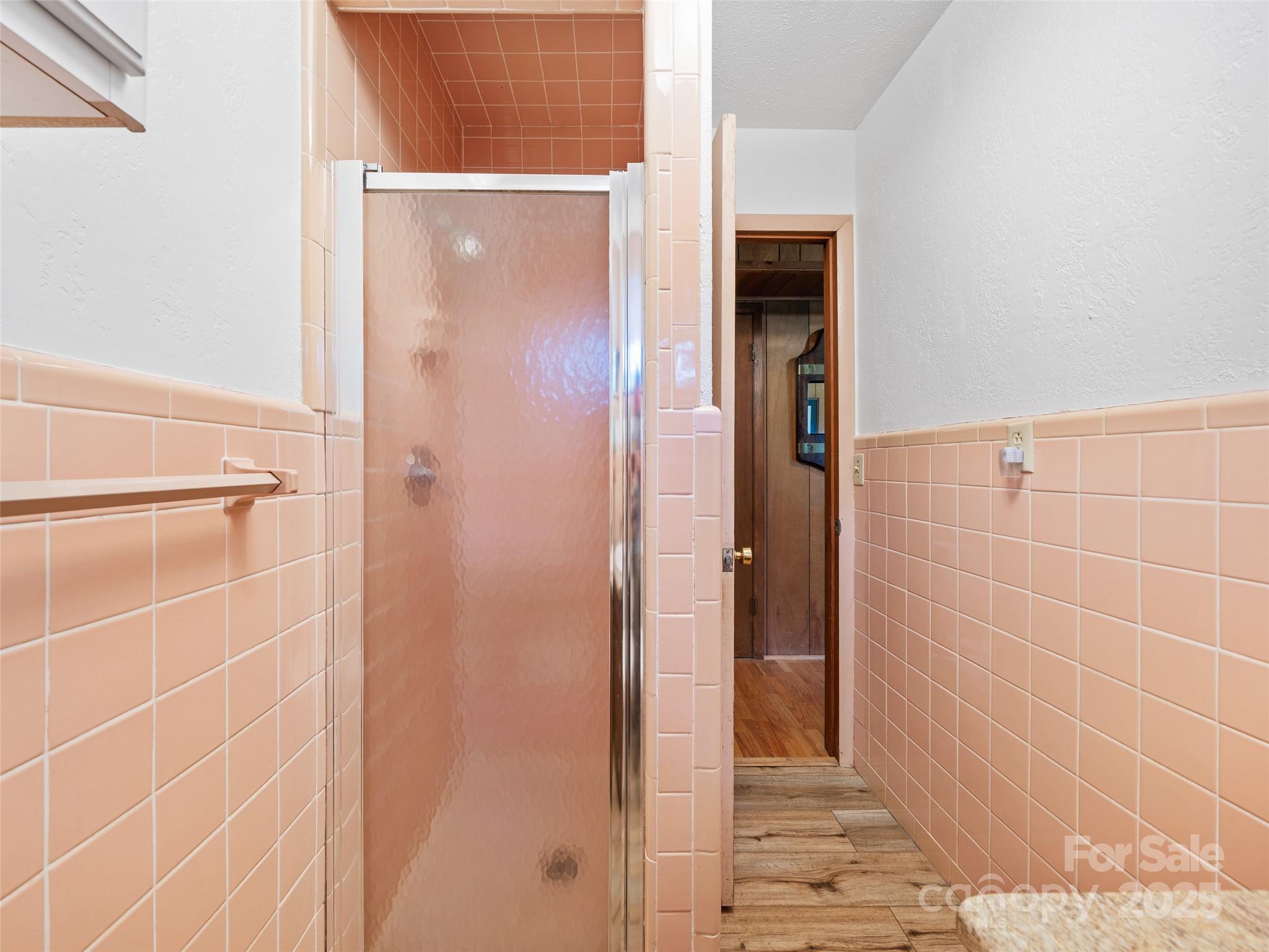 59 Deer Place Road Spruce Pine, NC 28777 - Photo 25 of 40 a bathroom with a mirror