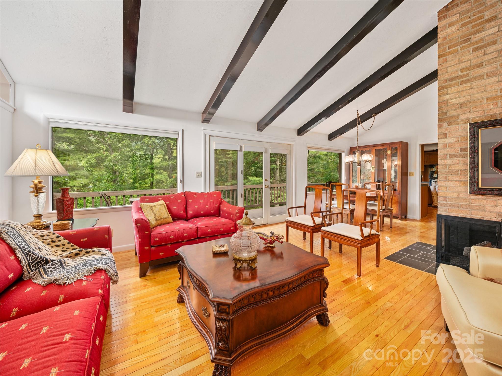 59 Deer Place Road Spruce Pine, NC 28777 - Photo 5 of 40 a living room with furniture and a large window