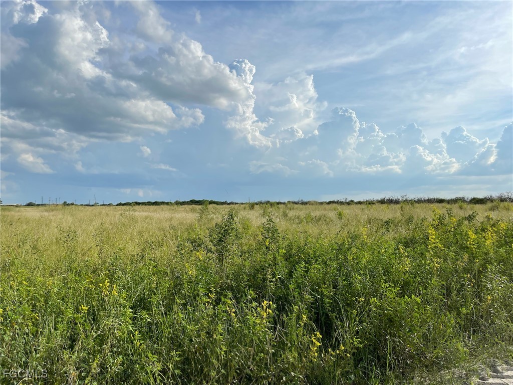 6985 6th Road LaBelle, FL 33935 - Photo 2 of 6 a view of lake and mountain