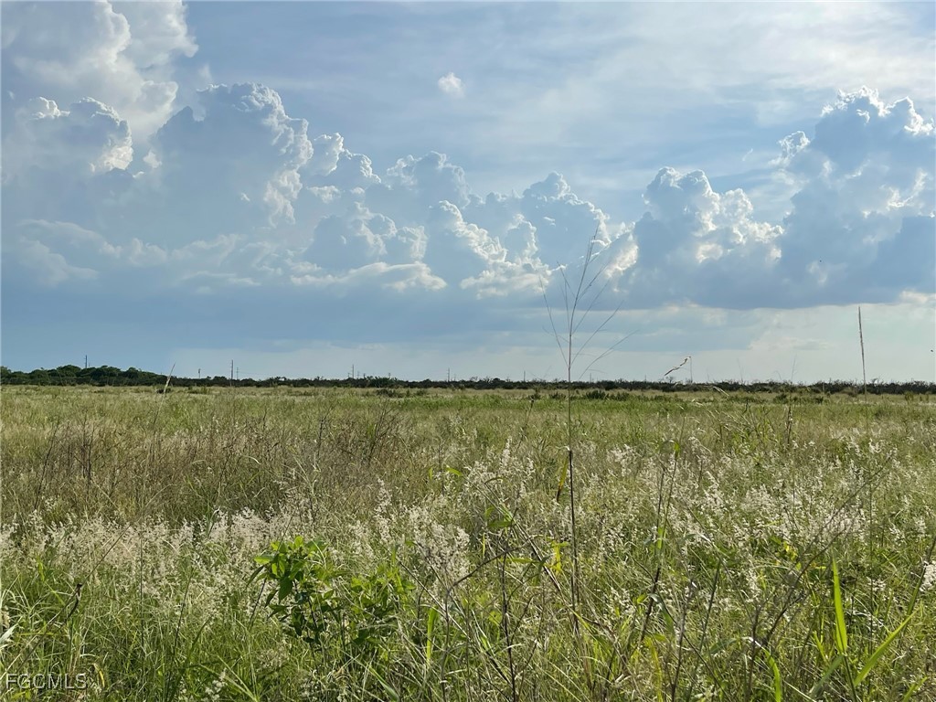 6985 6th Road LaBelle, FL 33935 - Photo 4 of 6 a view of an ocean and mountain