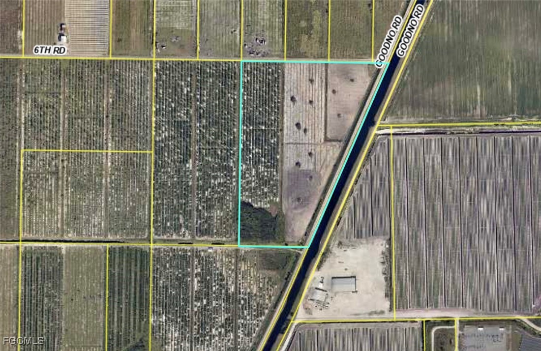 6985 6th Road LaBelle, FL 33935 - Photo 6 of 6 a view of balcony with wooden floor and white wall