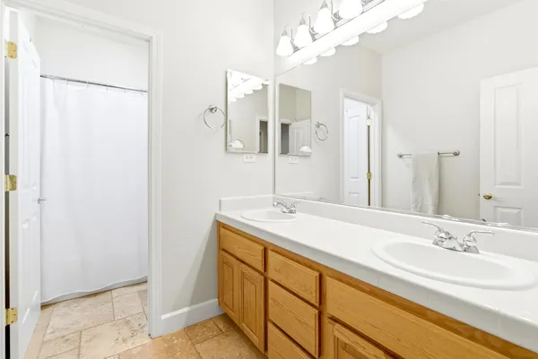 a bedroom with a bed and a cabinets