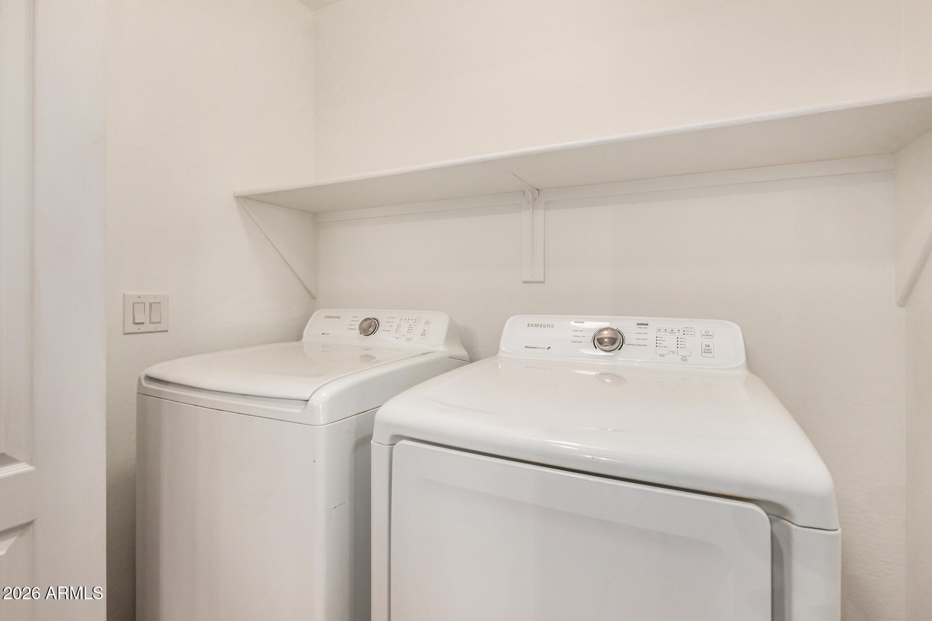 1784 South Seton Avenue Gilbert, AZ 85295 - Photo 20 of 27 a utility room with dryer and washer