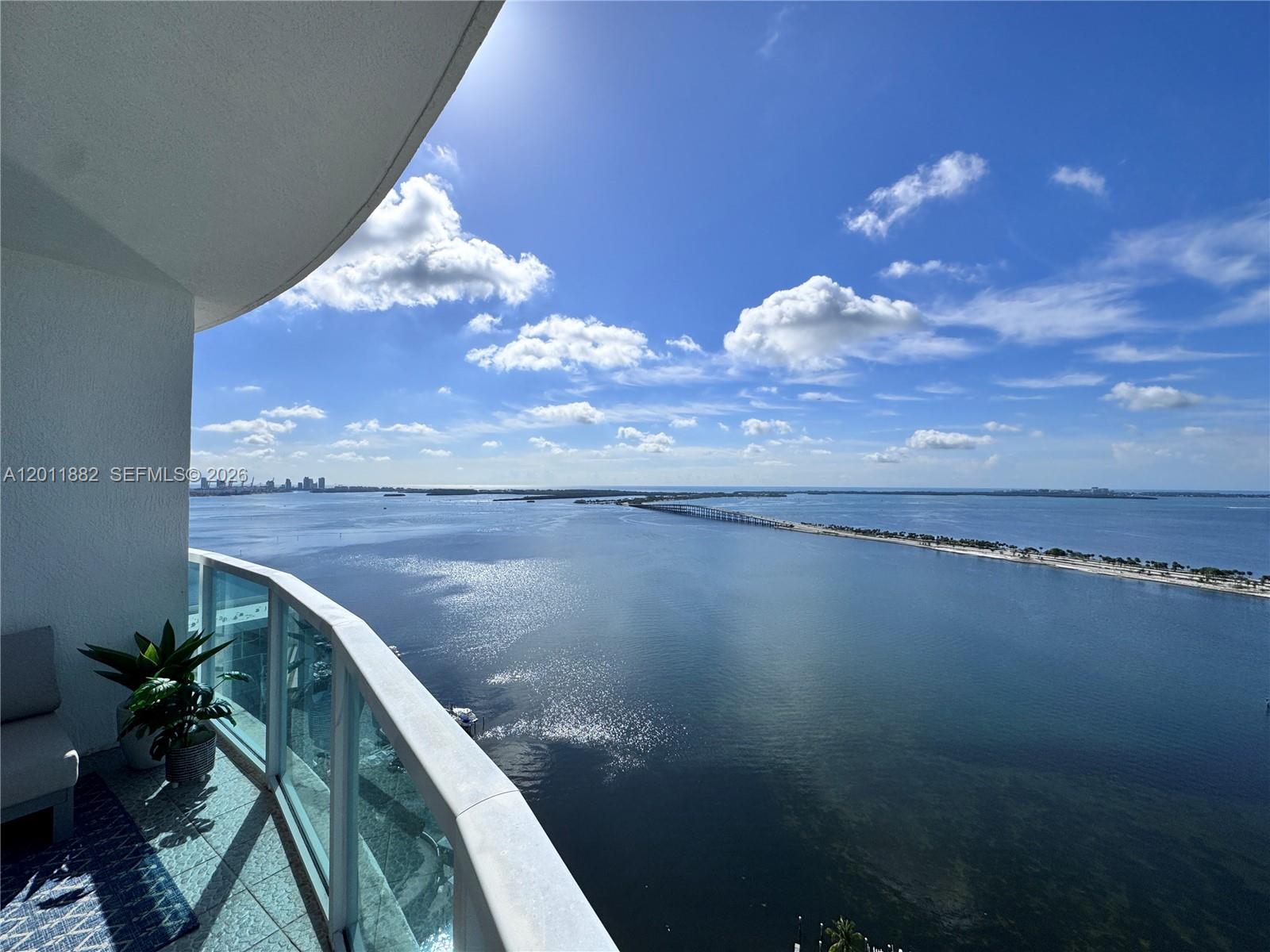 2101 Brickell Avenue, Unit 3205 Miami, FL 33129 - Photo 3 of 31 a view of a lake from a balcony