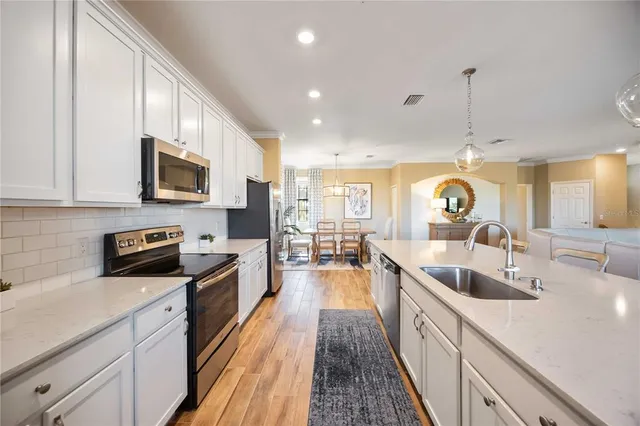 $427,000 | 10788 Tarflower Drive, Unit 202, Venice, FL 34293