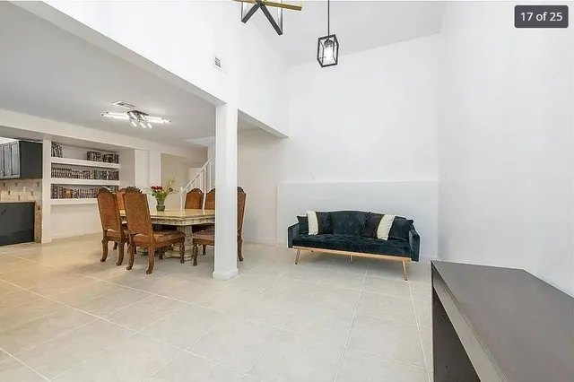 a view of workspace with furniture and window