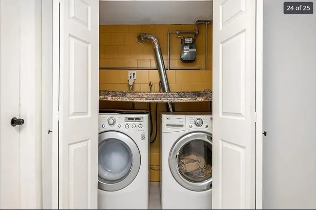 a utility room with dryer and washer