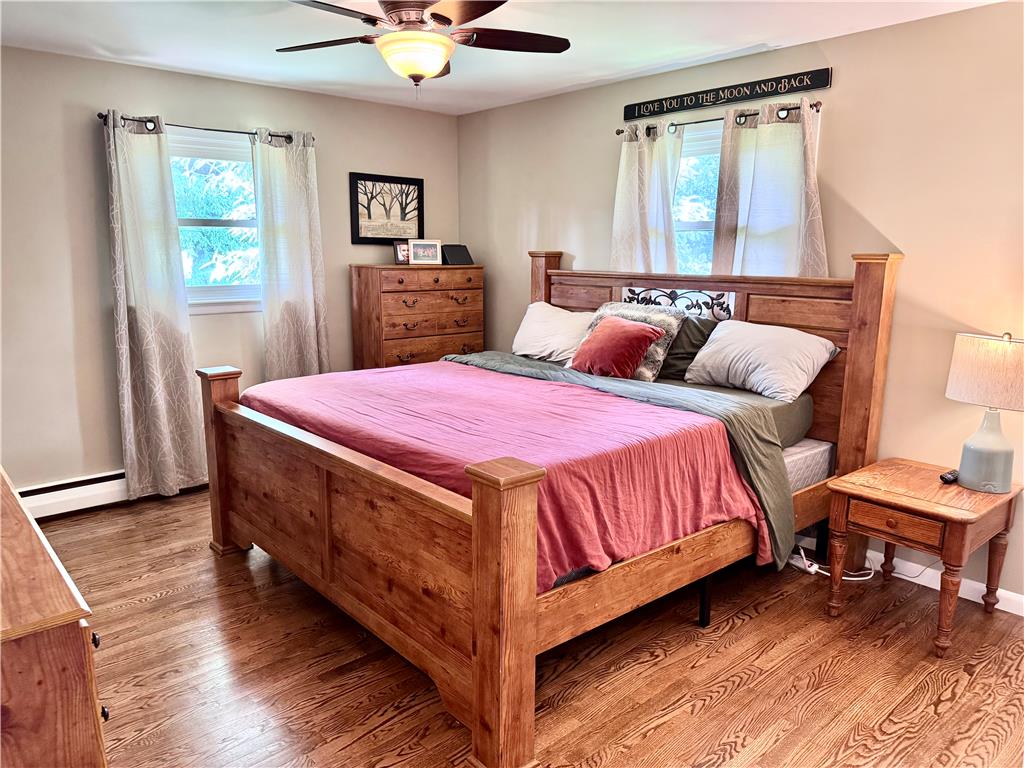 5334 Egypt Road Laurys Station, PA 18059 - Photo 22 of 55 Hardwood floors and a functional ceiling fan complement this cozy sleeping sanctuary.