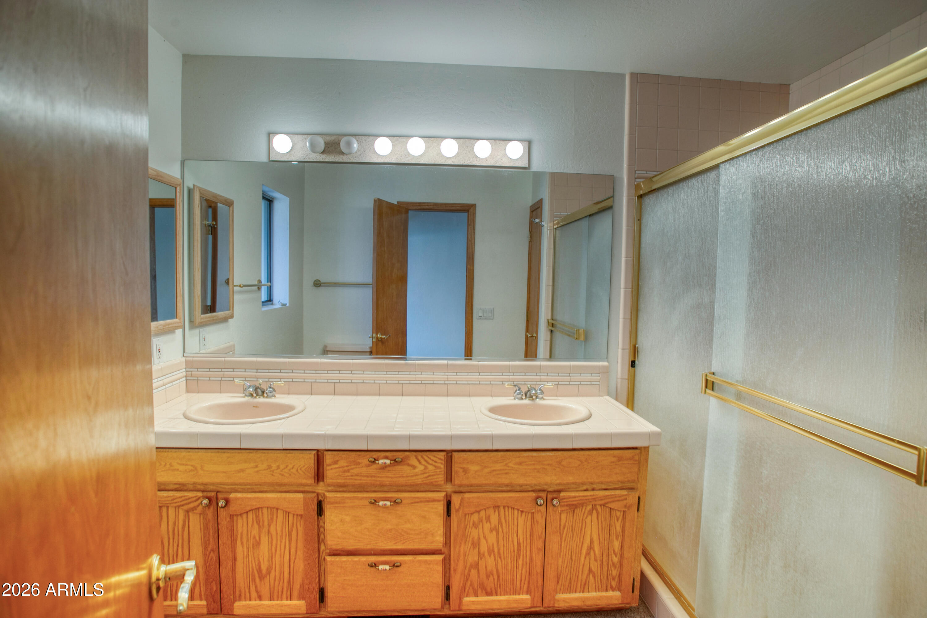 71 East Turkey Track Lane Pinetop, AZ 85935 - Photo 14 of 50 a bathroom with a sink and a mirror