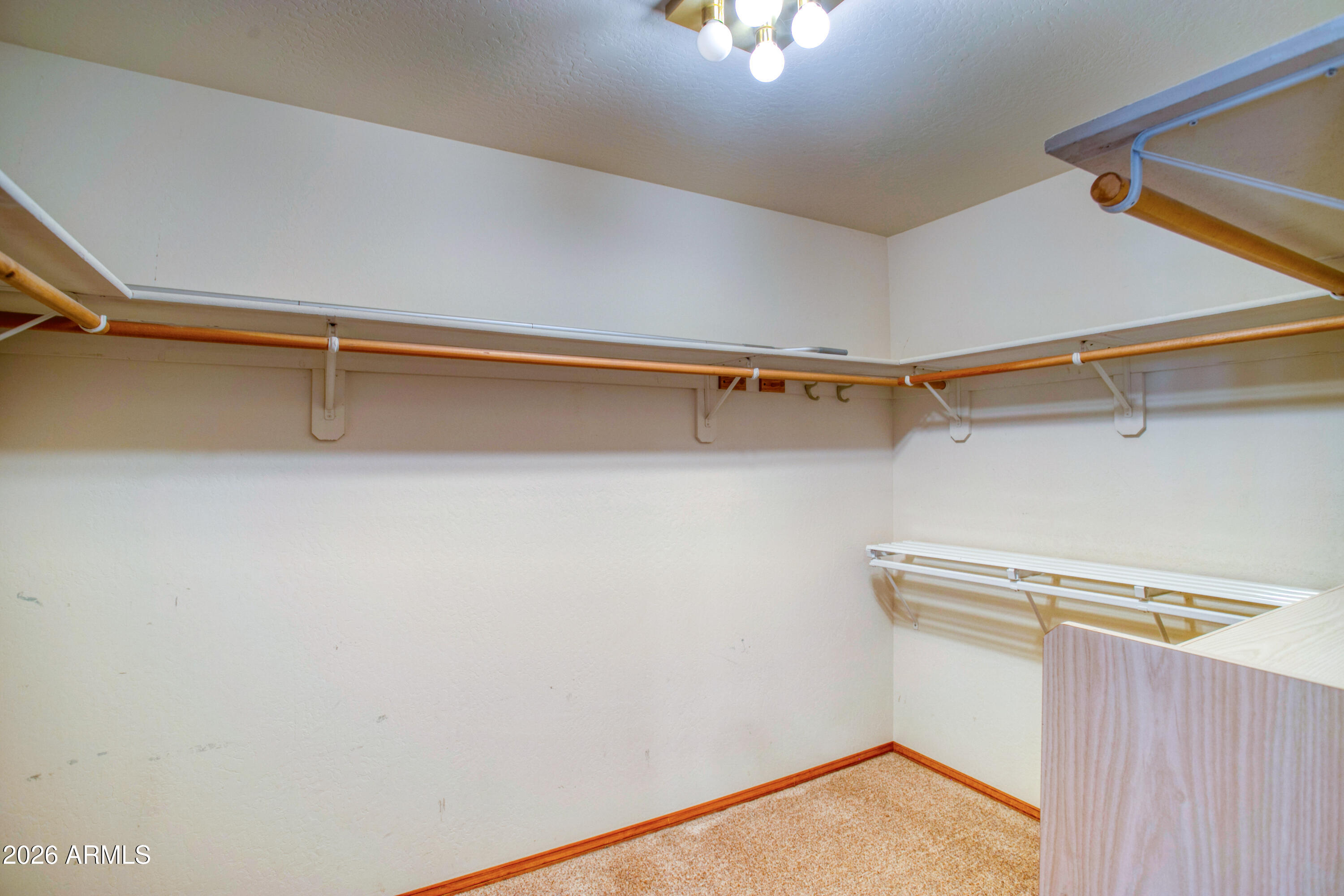 71 East Turkey Track Lane Pinetop, AZ 85935 - Photo 15 of 50 a view of a room with racks on the wall