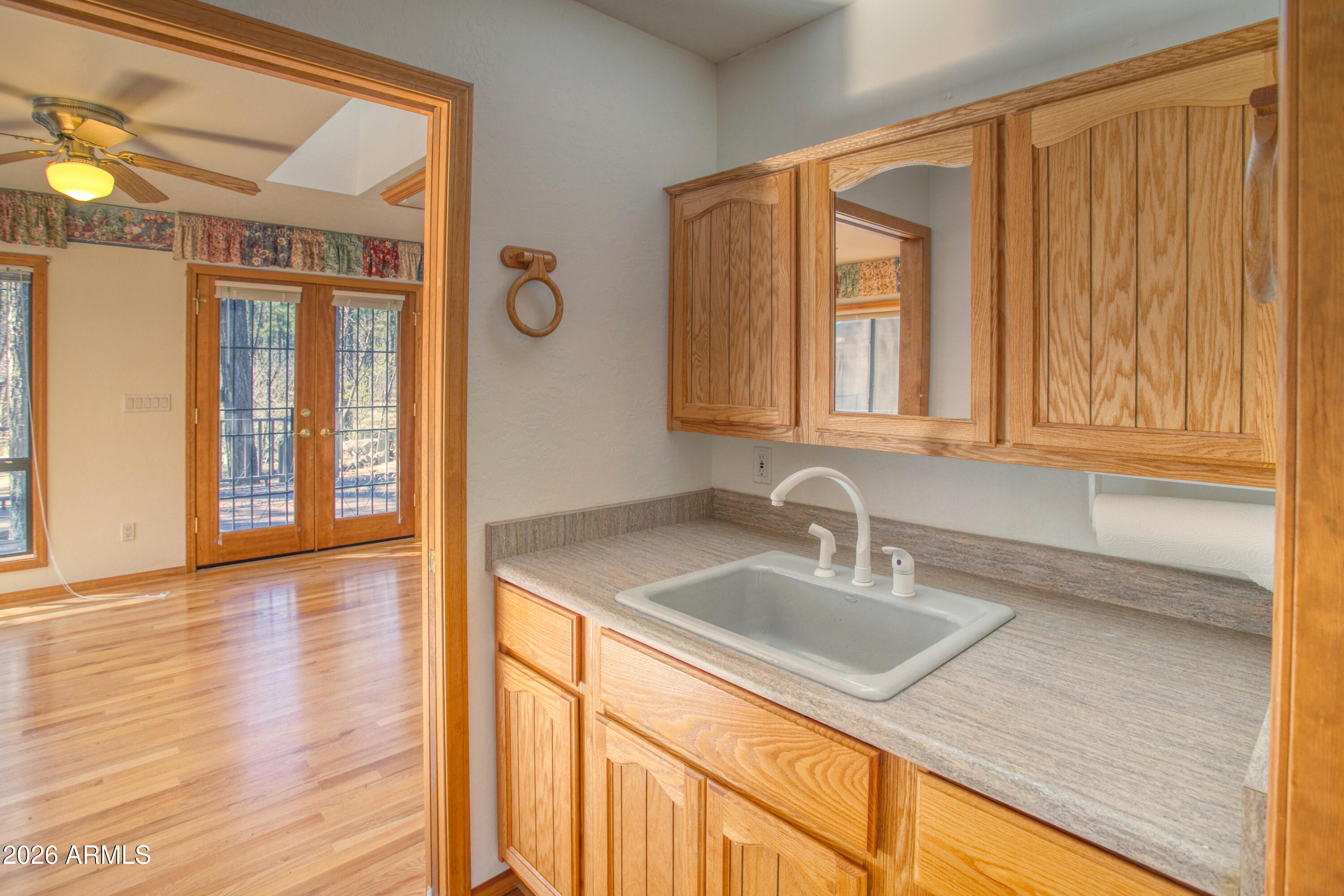 71 East Turkey Track Lane Pinetop, AZ 85935 - Photo 18 of 50 a bathroom with a sink and a mirror