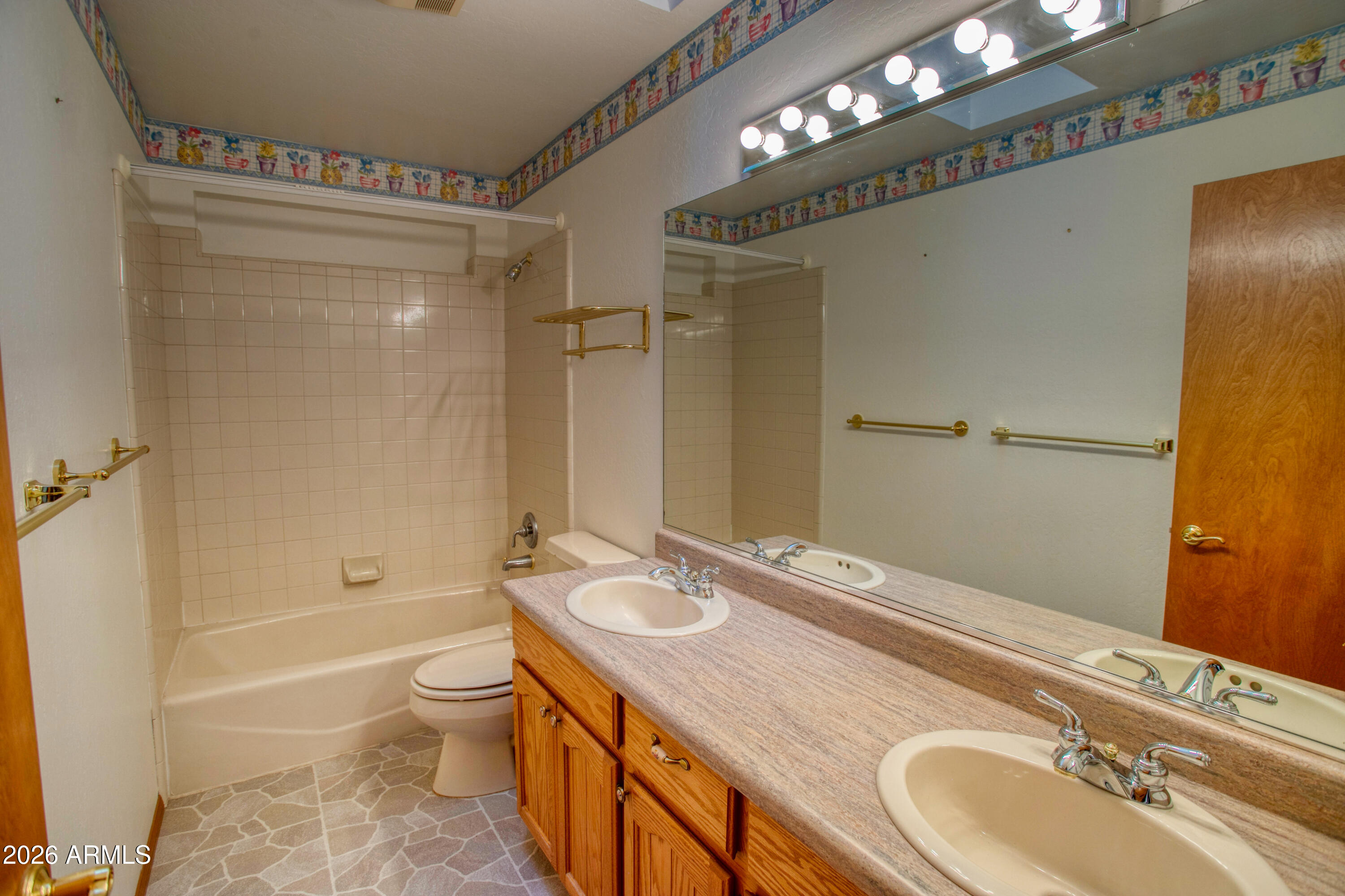 71 East Turkey Track Lane Pinetop, AZ 85935 - Photo 21 of 50 a bathroom with a granite countertop sink toilet and shower