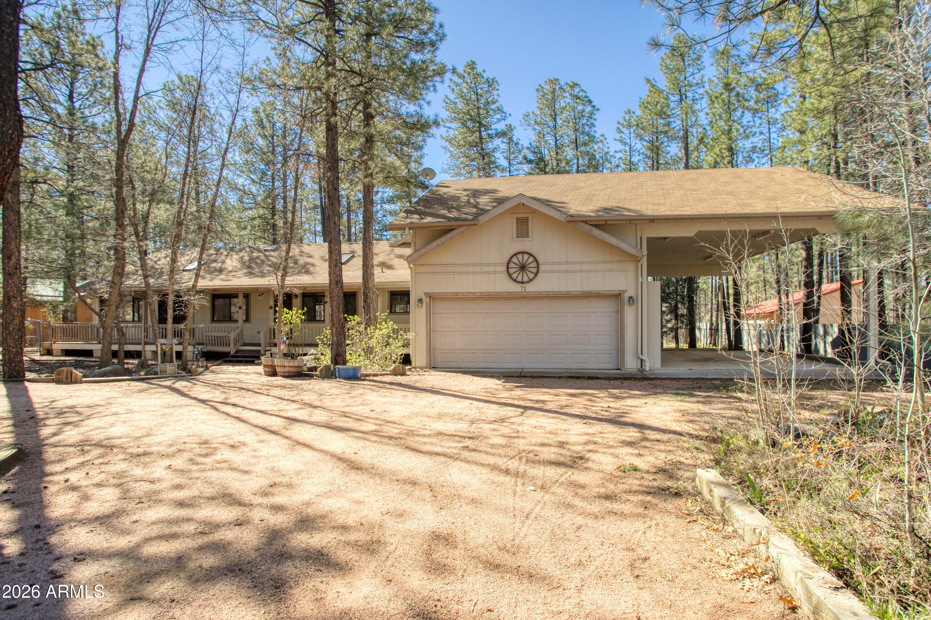 71 East Turkey Track Lane Pinetop, AZ 85935 - Photo 28 of 50 a view of a house with snow on the road