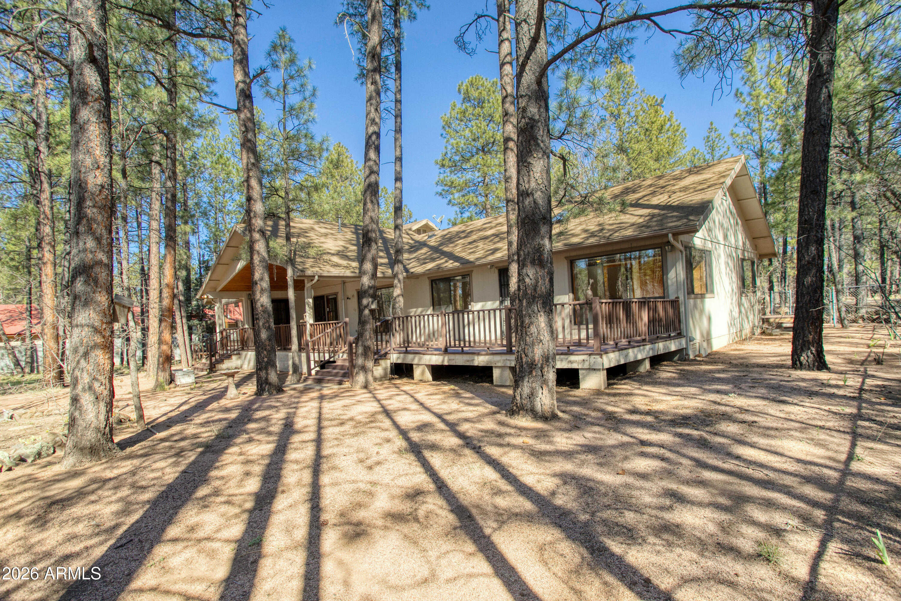 71 East Turkey Track Lane Pinetop, AZ 85935 - Photo 33 of 50 a view of a house with a yard