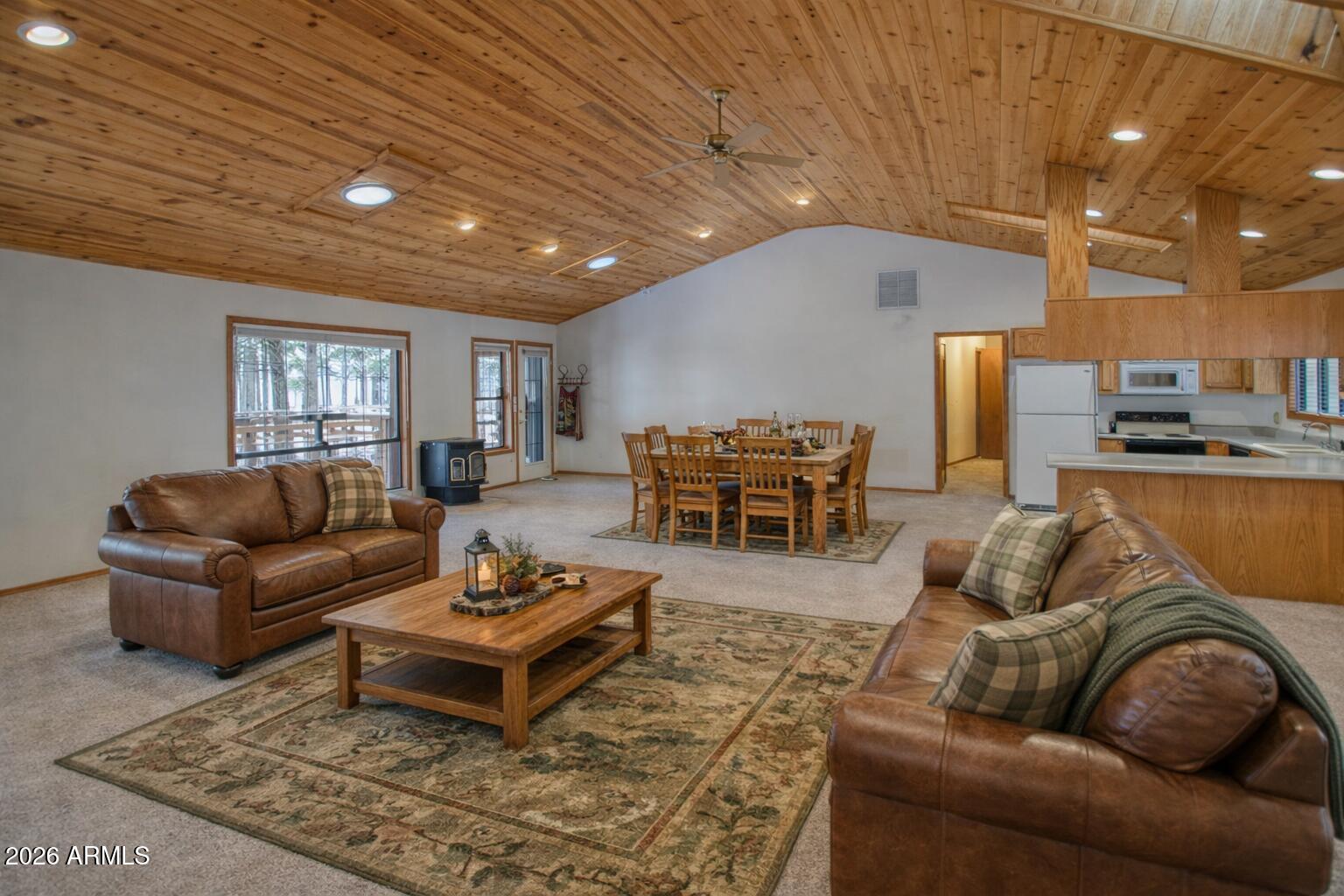 71 East Turkey Track Lane Pinetop, AZ 85935 - Photo 4 of 50 a living room with furniture potted plant and kitchen view