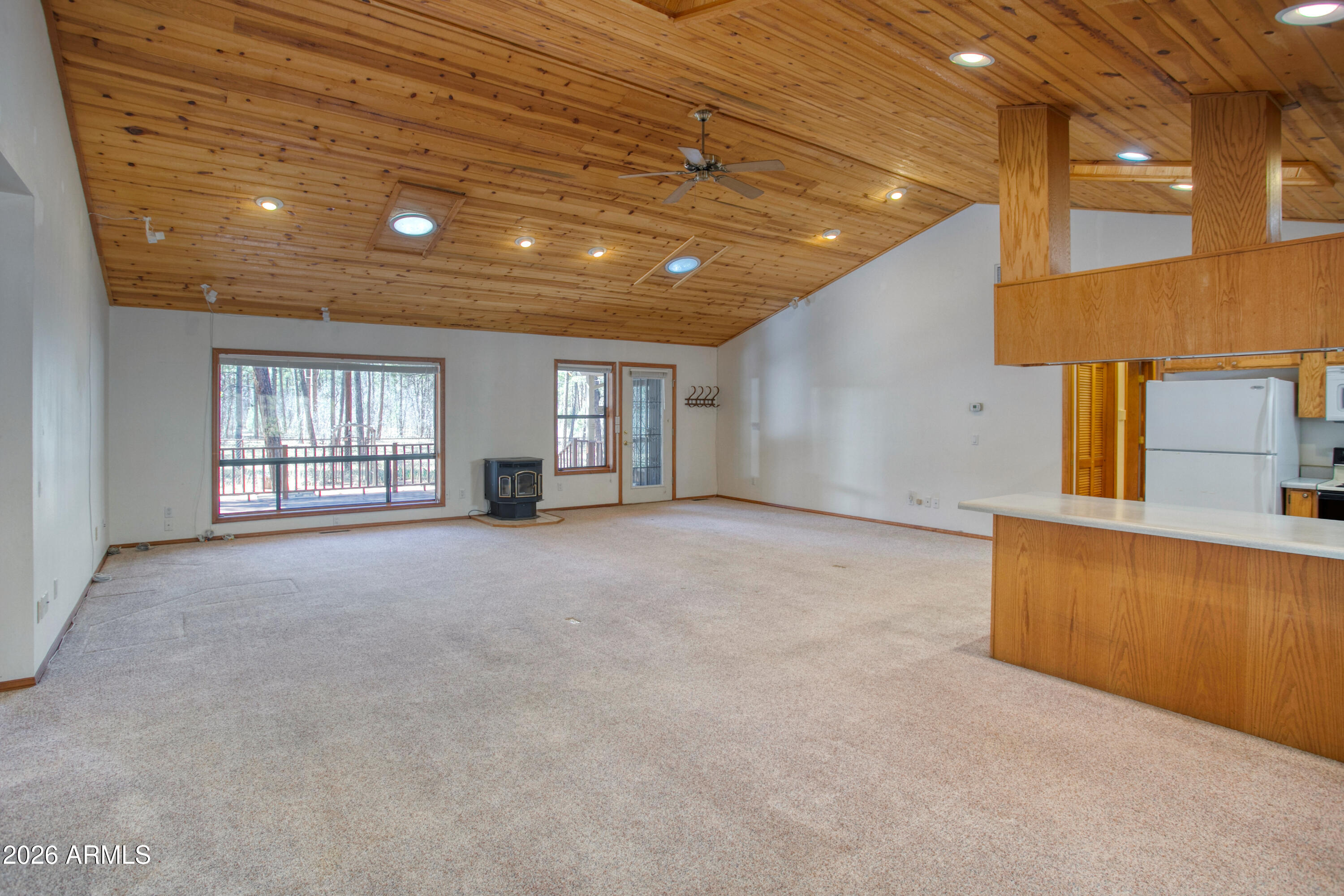71 East Turkey Track Lane Pinetop, AZ 85935 - Photo 6 of 50 a view of an empty room with a window