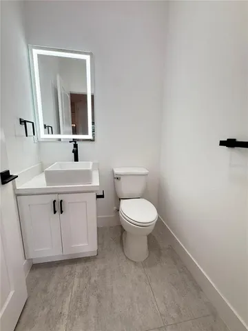 a view of swimming pool and outdoor seating