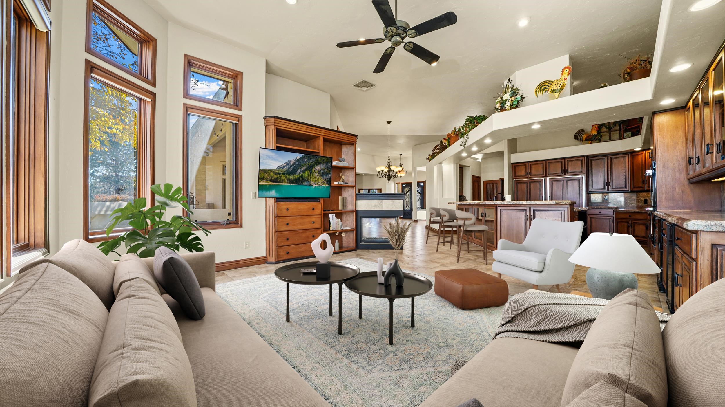 815 25 Road Grand Junction, CO 81505 - Photo 15 of 42 a living room with furniture kitchen view and a large window
