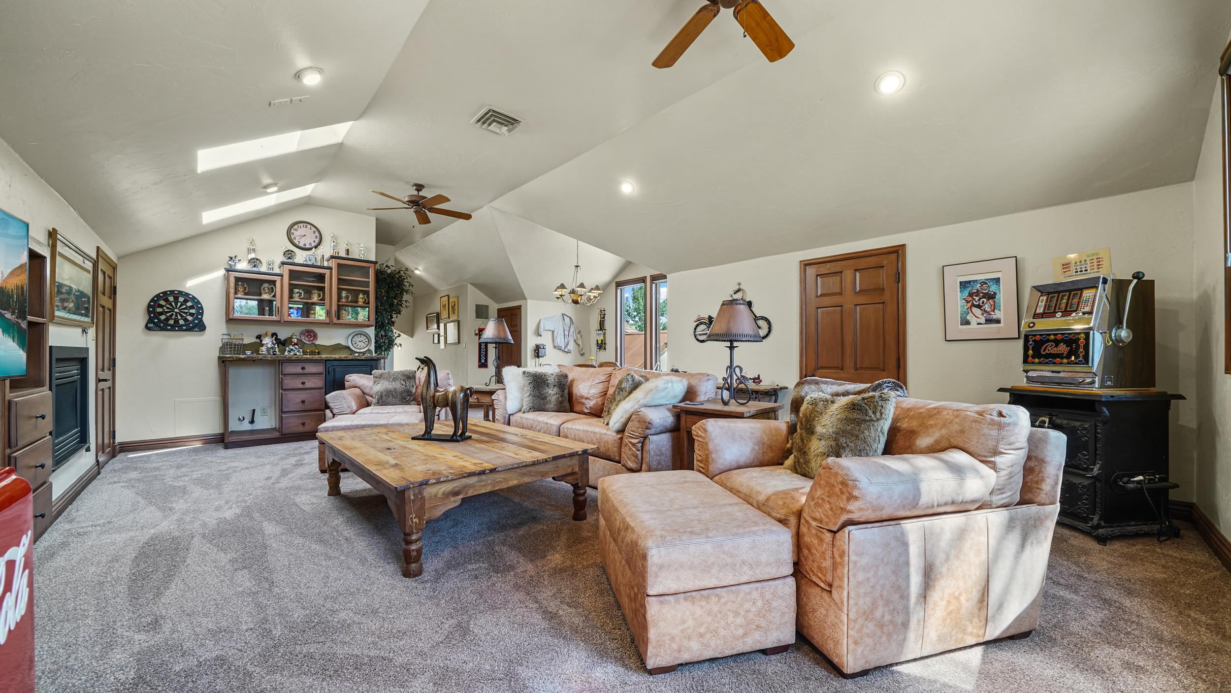 815 25 Road Grand Junction, CO 81505 - Photo 32 of 42 a living room with furniture and a flat screen tv