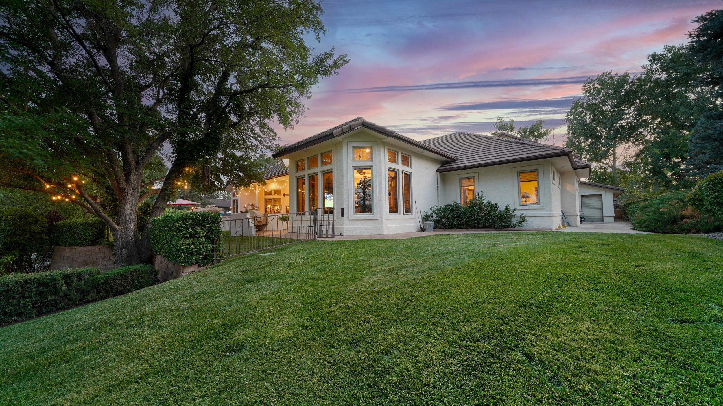 815 25 Road Grand Junction, CO 81505 - Photo 39 of 42 a front view of a house with a yard