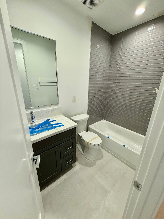 2630 Peckham Street Houston, TX 77098 - Photo 16 of 50 a bathroom with a sink a toilet and shower