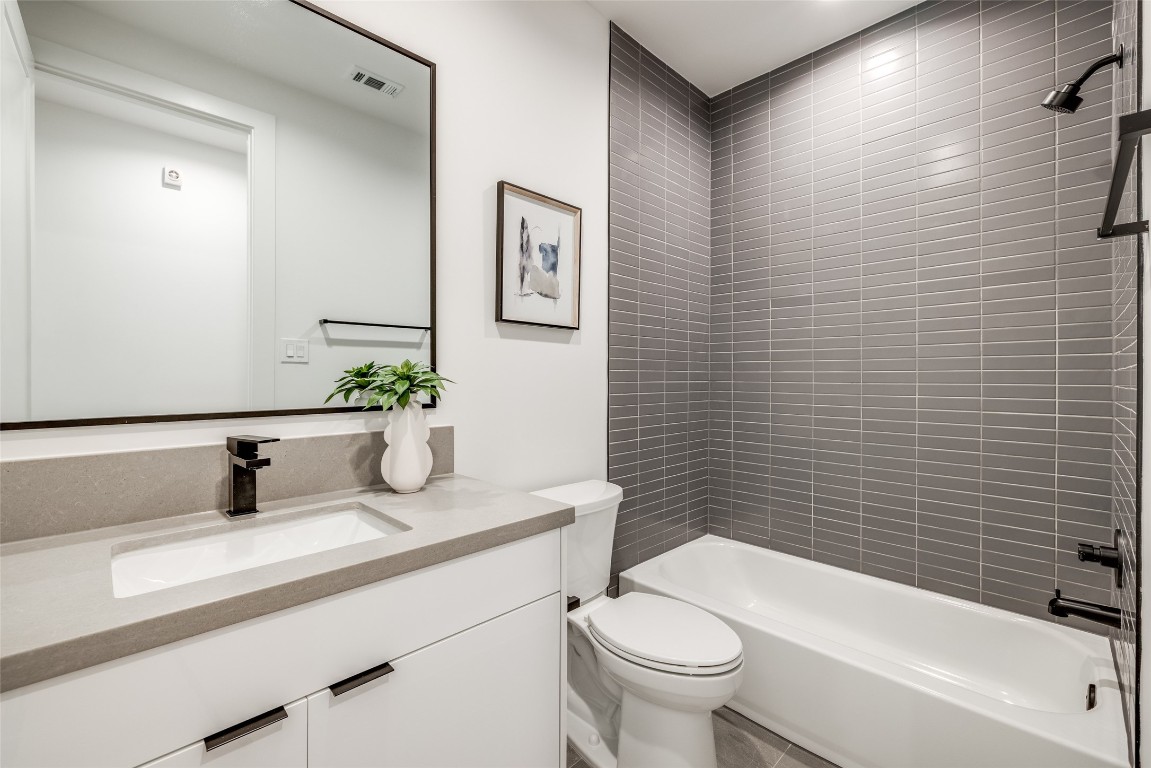 2630 Peckham Street Houston, TX 77098 - Photo 44 of 50 a bathroom with a sink a toilet and shower