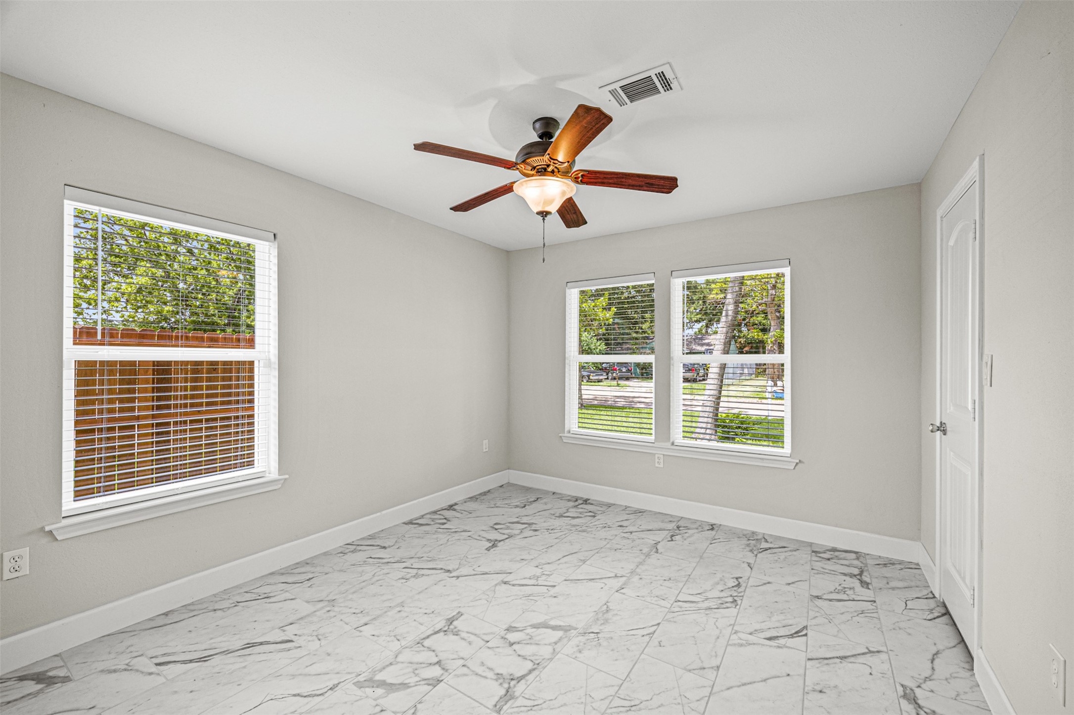 702 Norell Street Channelview, TX 77530 - Photo 14 of 16 a view of an empty room with a window