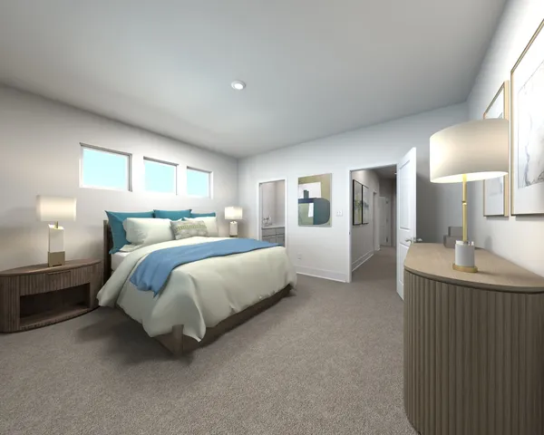 a bedroom with a bed and a lamp