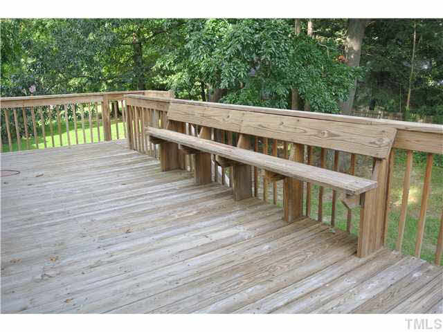 3908 Summer Place Raleigh, NC 27604 - Photo 11 of 15 a balcony with wooden floor and fence