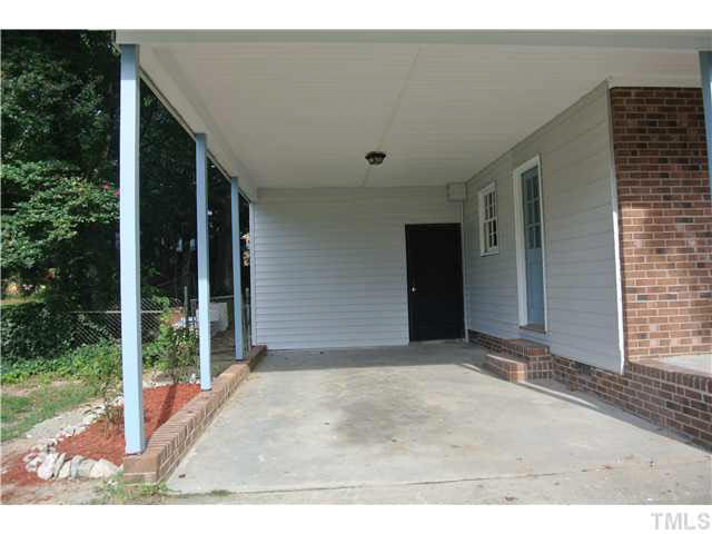 3908 Summer Place Raleigh, NC 27604 - Photo 13 of 15 a view of backyard with garden