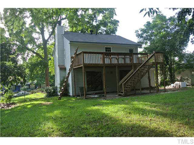3908 Summer Place Raleigh, NC 27604 - Photo 15 of 15 a view of a barn with a big yard and a large tree
