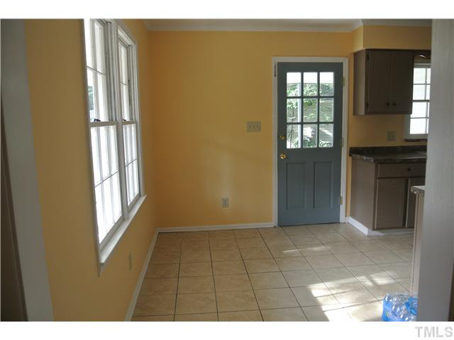 3908 Summer Place Raleigh, NC 27604 - Photo 4 of 15 a view of an empty room with a window