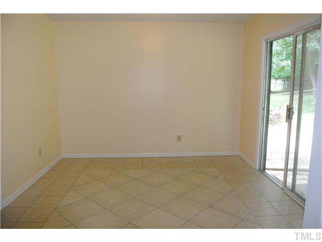 3908 Summer Place Raleigh, NC 27604 - Photo 7 of 15 a view of an empty room and window