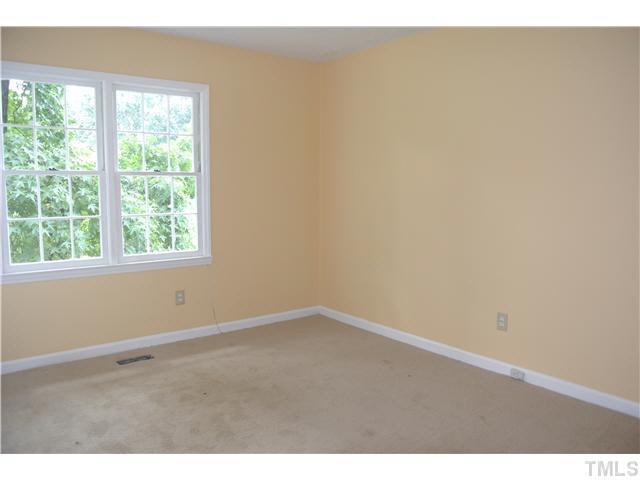 3908 Summer Place Raleigh, NC 27604 - Photo 9 of 15 an empty room with a window
