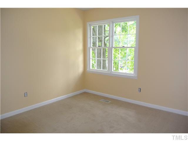 3908 Summer Place Raleigh, NC 27604 - Photo 10 of 15 a view of an empty room with a window