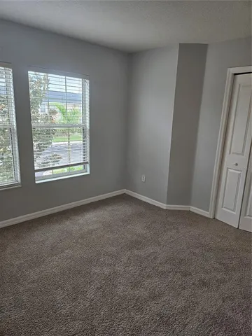 a kitchen with granite countertop a sink and a stove top oven