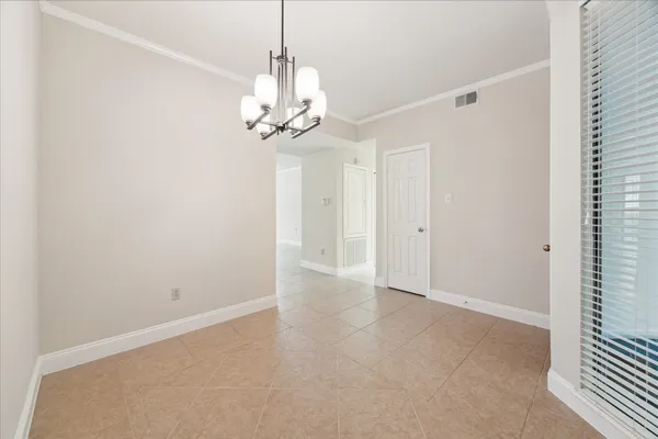 a view of a chandelier in a room