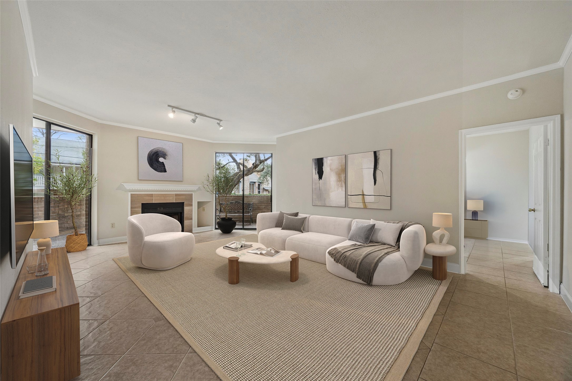 5220 Weslayan Street, Unit 109 Houston, TX 77005 - Photo 9 of 21 Spacious living room with tree views and sliders that lead out to a wrap around patio.
Virtually Staged