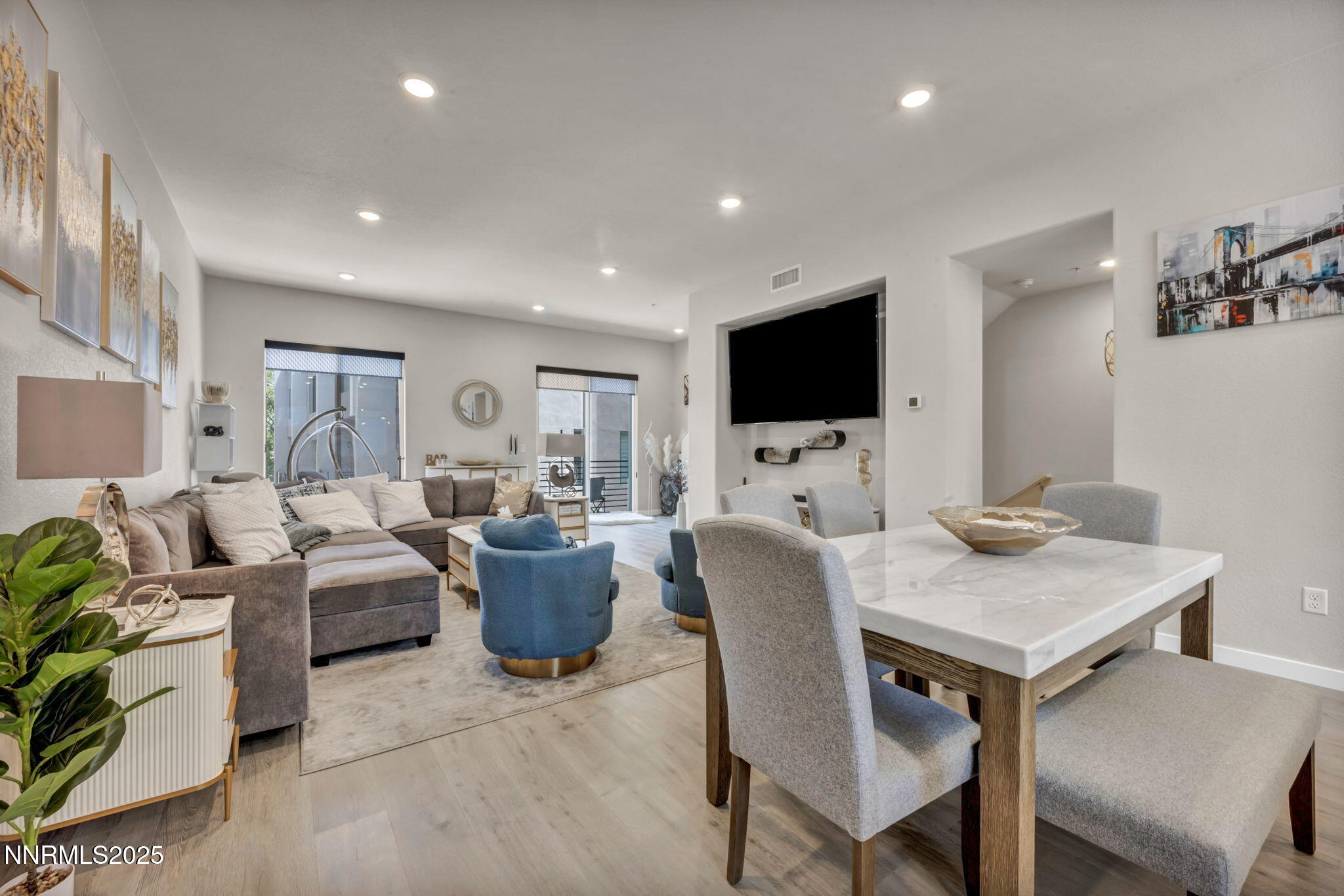 150 Rissone Lane Reno, NV 89503 - Photo 13 of 53 a living room with furniture and a flat screen tv