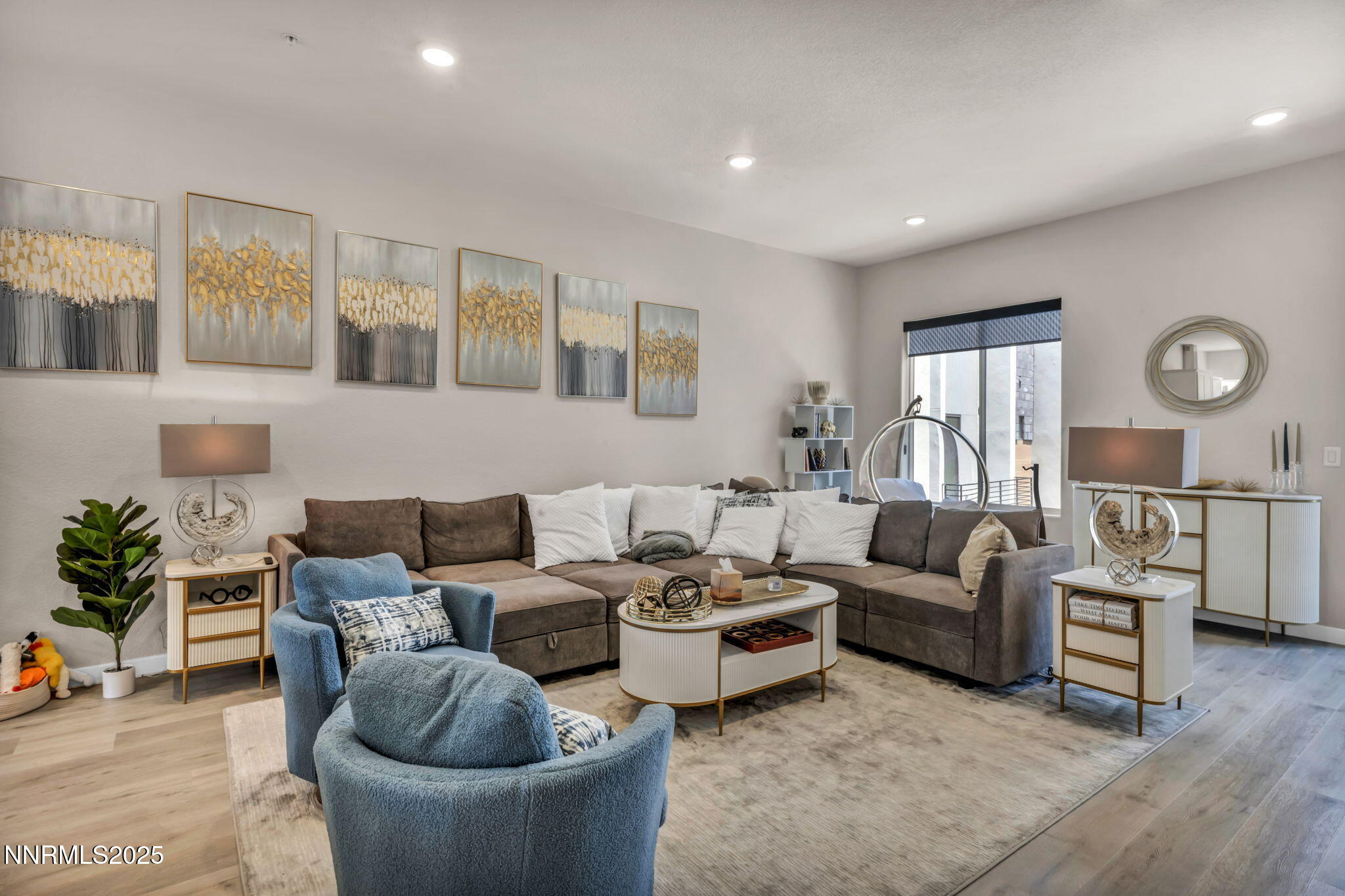 150 Rissone Lane Reno, NV 89503 - Photo 15 of 53 a living room with furniture and wooden floor